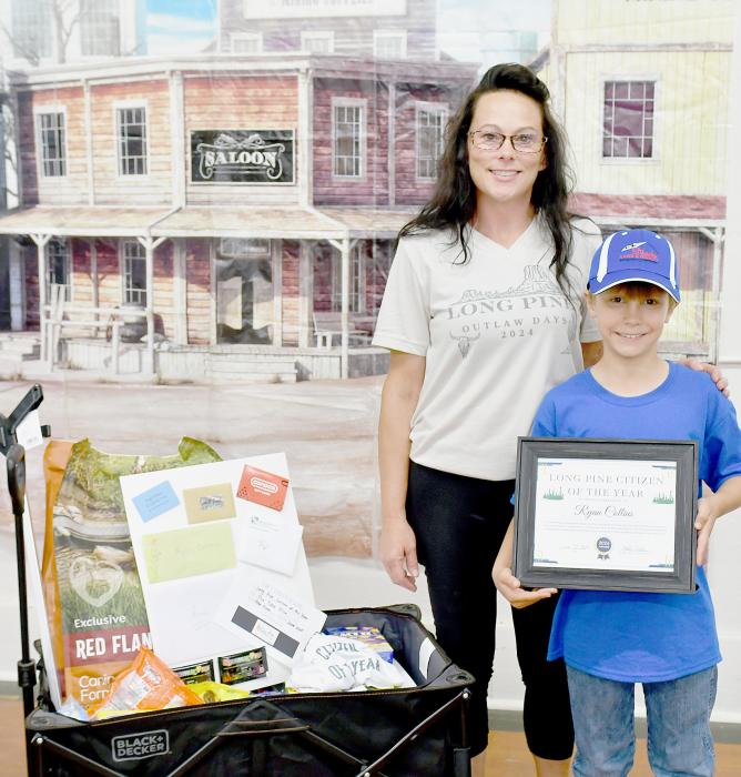Candace Larson, representing the Long Pine Chamber of Commerce, recognized the 2024 Long Pine Citizen of the Year - Ryan Collins. Lots of fun items were donated by businesses in Long Pine and Ainsworth for a job well done for cleaning up the Long Pine Recreation Park and throughout the Long Pine.