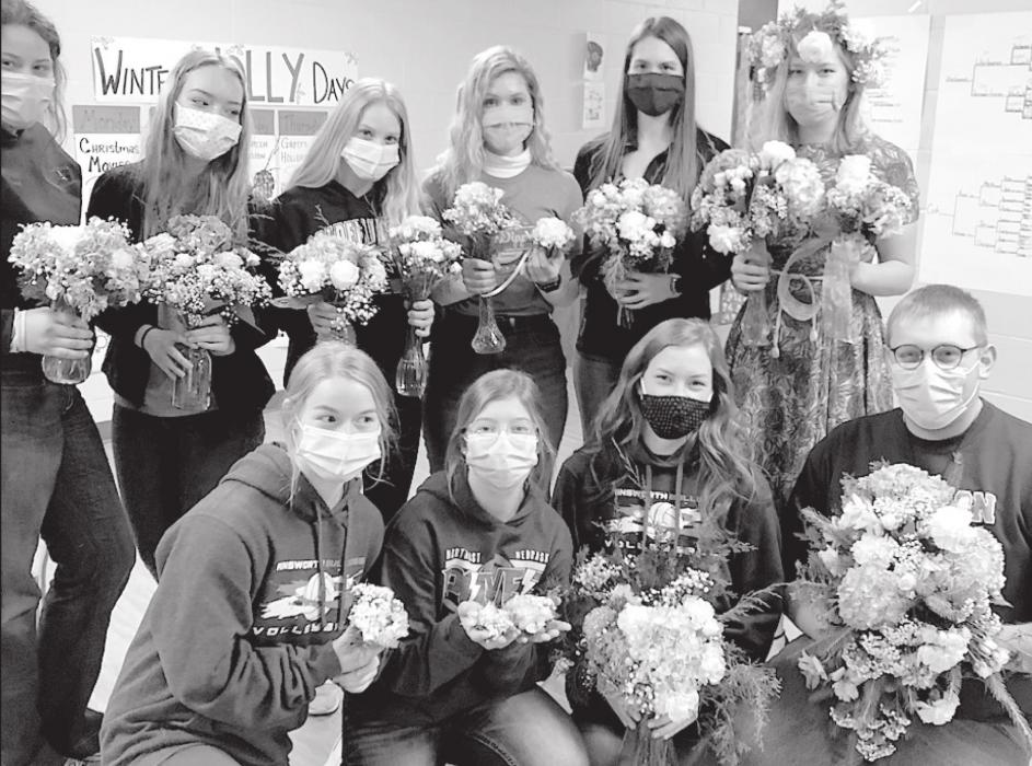 Ainsworth Floriculture class members display their finished mock wedding arrangements. Members are (Front Row - Left to Right): Kerstyn Held, Saylen Young, Eden Raymond and Cody Kronhofman; (Back Row - Left to Right): Aliya Keezer, Shaley Starkey, Cailin Orton, Maren Arens, Haley Schroedl and Alyssa Erthum.