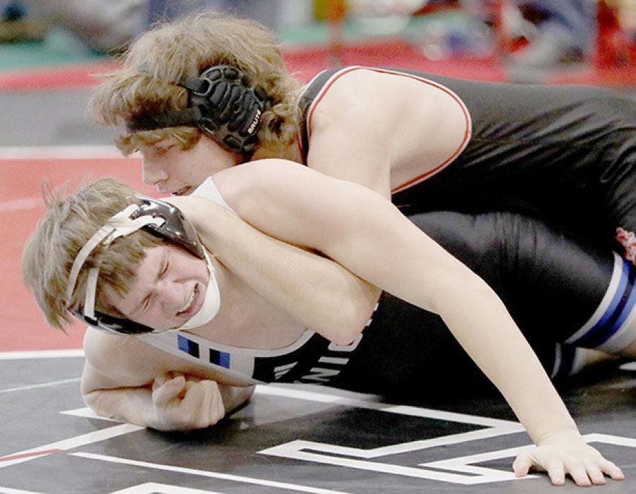 Nacona Shurter won by fall in 2:56 over Kade Wiiest of North Central in the 157 lb. weight class.